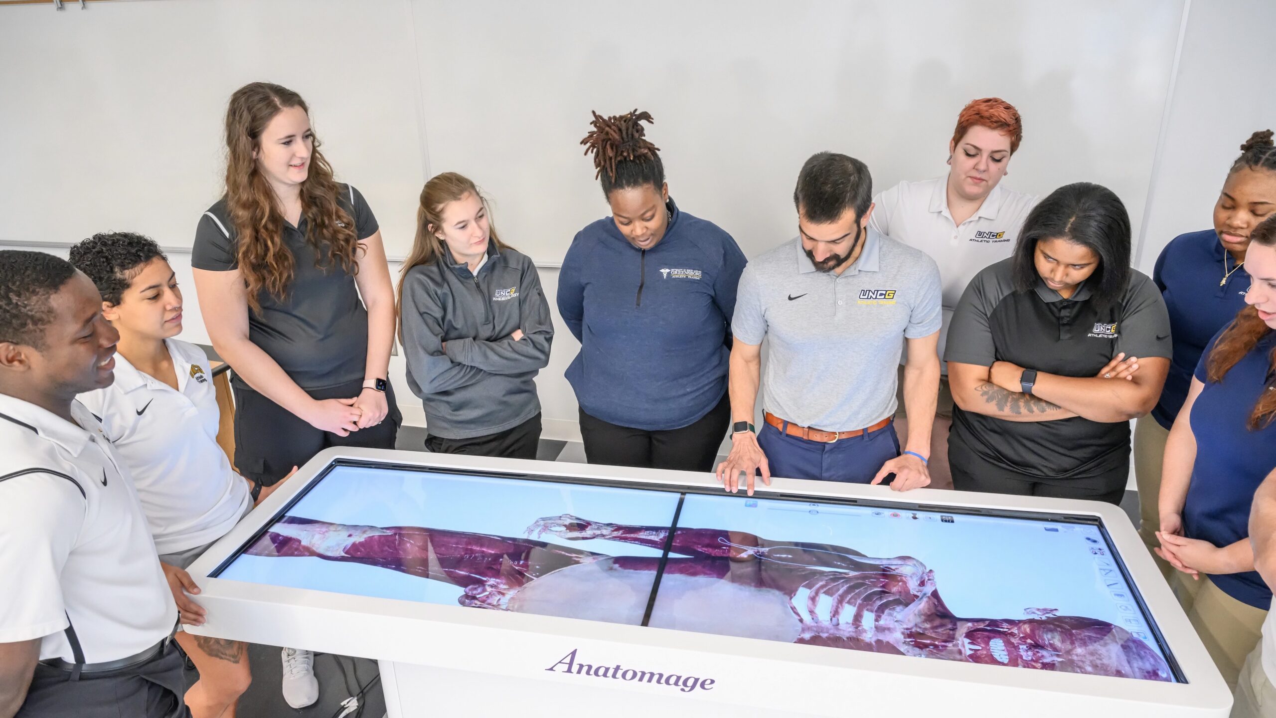 Anatomage table with faculty and students