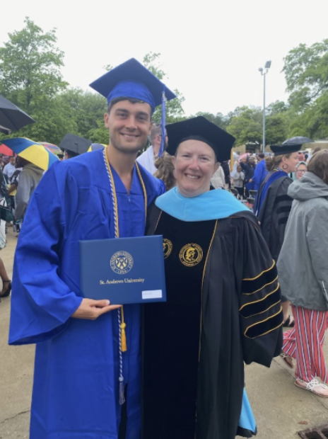 Callie Phillips with one of her former students at St. Andrews University.